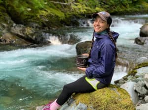 hiker eating a backpacking meal