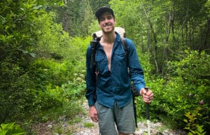 shows hiker using ultralight backpacking tips