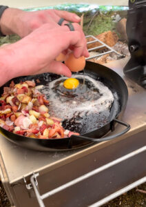 Cooking breakfast on our tent stove.